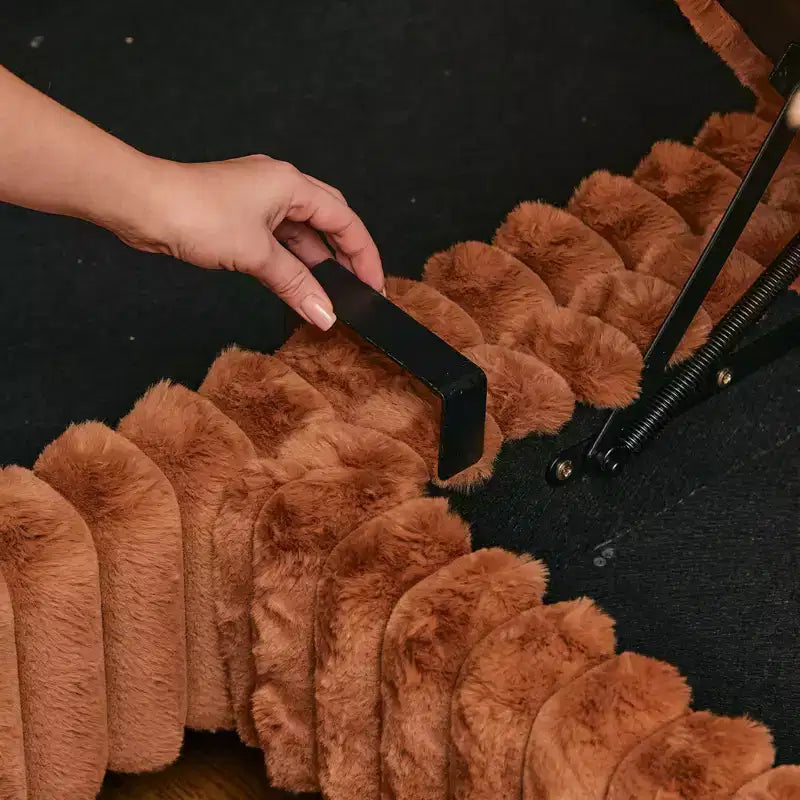 Cordhocker mit Stauraum für modulare Ecksofas